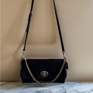 Black with gold hardware Coach crossbody.